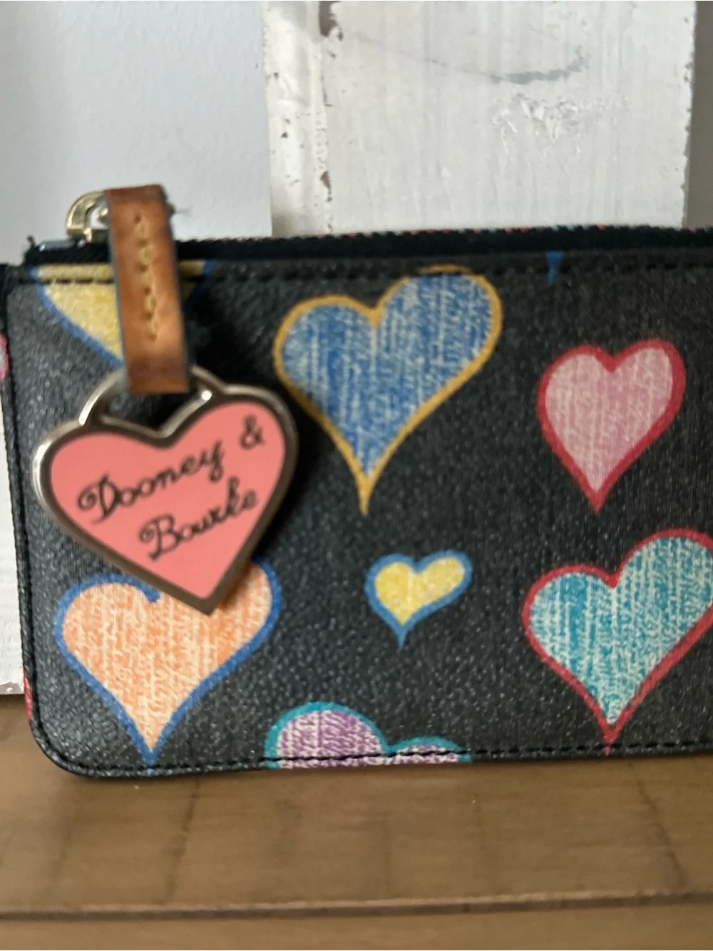 Dooney & Bourke Black Tiny Wristlet with Multicolor Heart Print